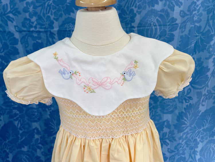 smocked dress with embroidery,