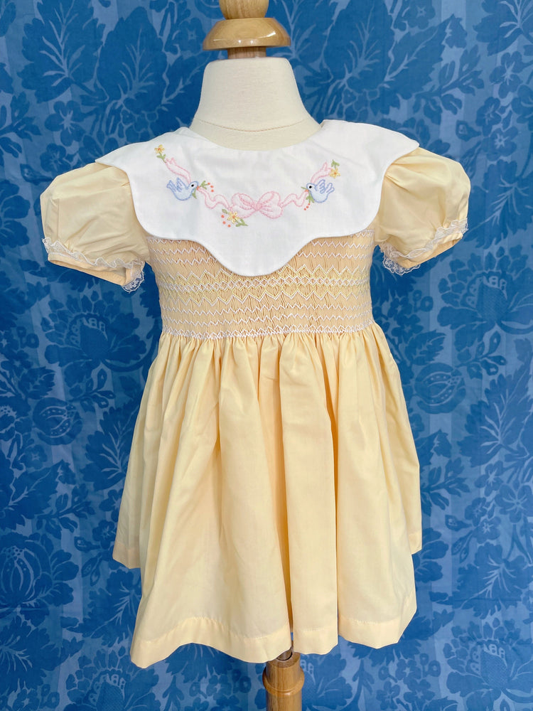 smocked dress with embroidery,